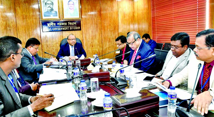 Local Government Division Minister Md Tajul Islam MP speaking as Chief Guest at a special meeting on progress of implementation of projects of Department of Public Health and Dhaka WASA at the Ministry's Conference Room yesterday .