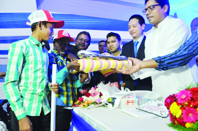 NATORE: Blankets with maflours and scarfs were distributed among the poor and disabled people at Singair Upazila organised by China Railway International Group Co Ltd (CRIG) recently.