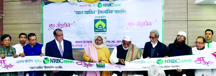 State Minister for Religious Affairs Sheikh Md. Abdullah launching NRB Commercial Bank's Shariah based Islamic Banking Window 'Al Amin' at a ceremony held at the bank's head office in Dhaka on Monday.