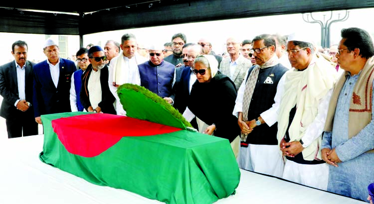 Prime Minister Sheikh Hasina paying tributes to Awami League lawmaker of Bogura late Abdul Mannan by placing wreath on his coffin at the South Plaza of Jatiya Sangsad Bhaban on Monday. BSS photo