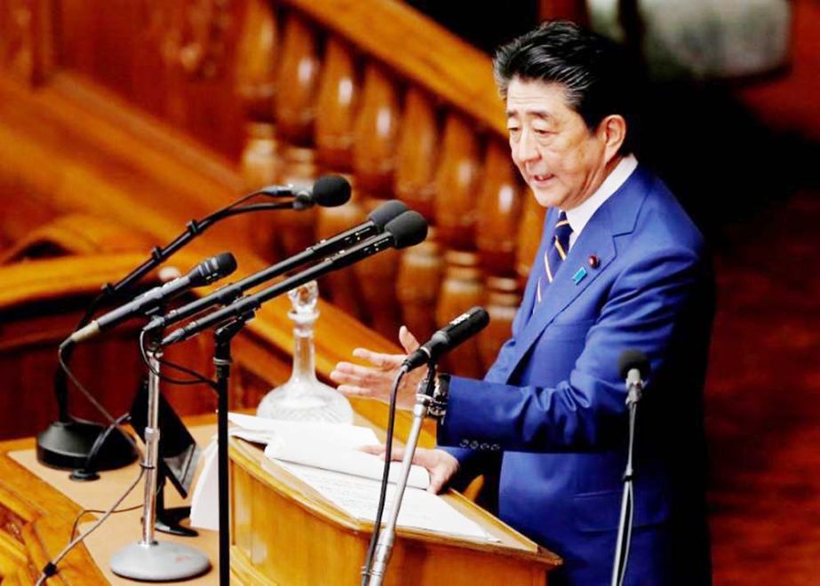 Japanese Prime Minister Shinzo Abe gives a policy speech at the start of the regular session of parliament in Tokyo, Japan on Monday.