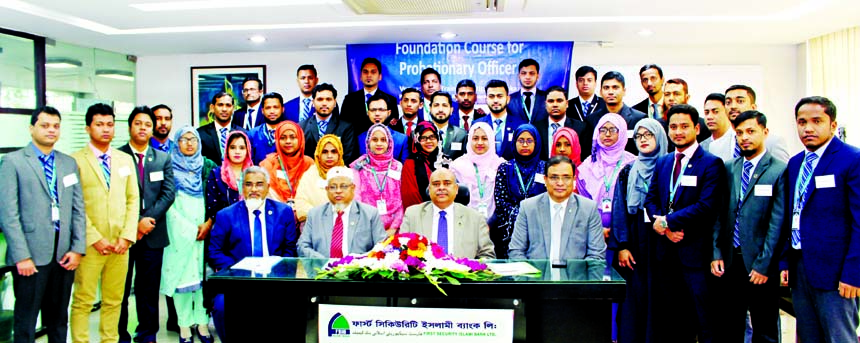 Syed Waseque Md. Ali, Managing Director of First Security Islami Bank Limited, poses for photograph with the participants of the 50th foundation course for newly recruited probationary officers of the bank at its training institute in the city on Tuesday.