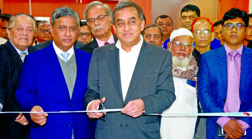 Sayeed H. Chowdhury, Chairman of ONE Bank Limited, inaugurating its 103rd branch at Chowgacha in Jashore on Tuesday. Zahur Ullah, EC Chairman, ASM Shahidullah Khan, Kazi Rukunuddin Ahmed, Directors and M. Fakhrul Alam, Managing Director of the bank, were