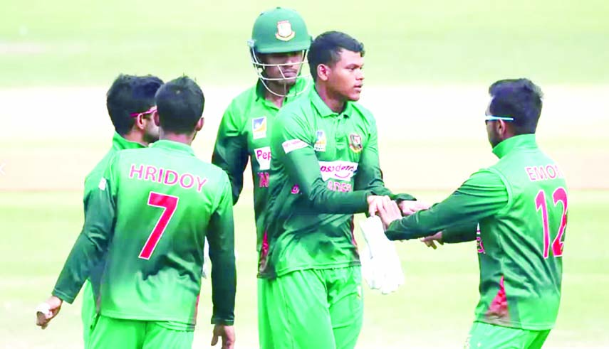 Rakibul Hasan (2nd from right) of Bangladesh Under-19 Cricket team, celebrating his hat-trick with his teammates against Scotland Under-19 Cricket team in their match of the ICC Under-19 Cricket World Cup at Pochefstroom in South Africa on Tu