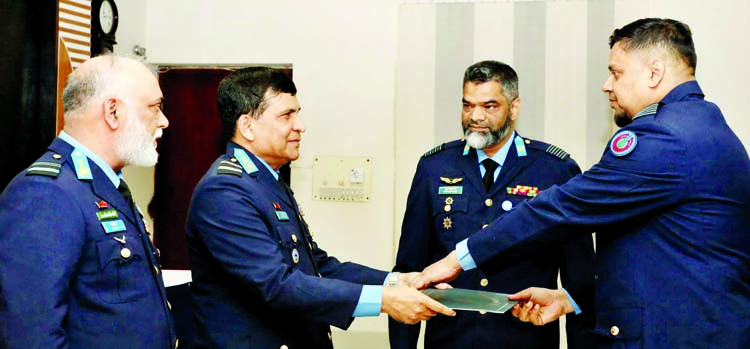 Assistant Chief of Air Staff (Operations) of BAF, Air Vice Marshal M Abul Bashar giving away certificates among the graduating officers of No 08 Squadron Commanders' Officers' Course of BAF at CSTI, Dhaka Cantonment on Tuesday. ISPR photo