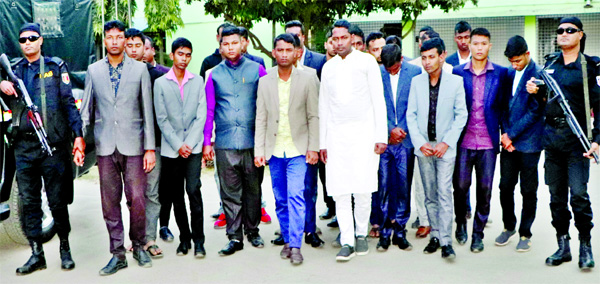 About thirty members of organised gang of fraudsters were arrested by RAB-4 for swindling huge money fraudulently from city's Uttara area on Wednesday.
