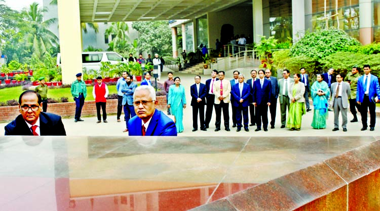 Chairman of Bangladesh Public Service Commission Dr. Mohammad Sadik, along with other members of the commission paying tributes by placing wreaths on the plaque 'Mrityunjayee' on the premises of the commission on Thursday on retirement of its two member