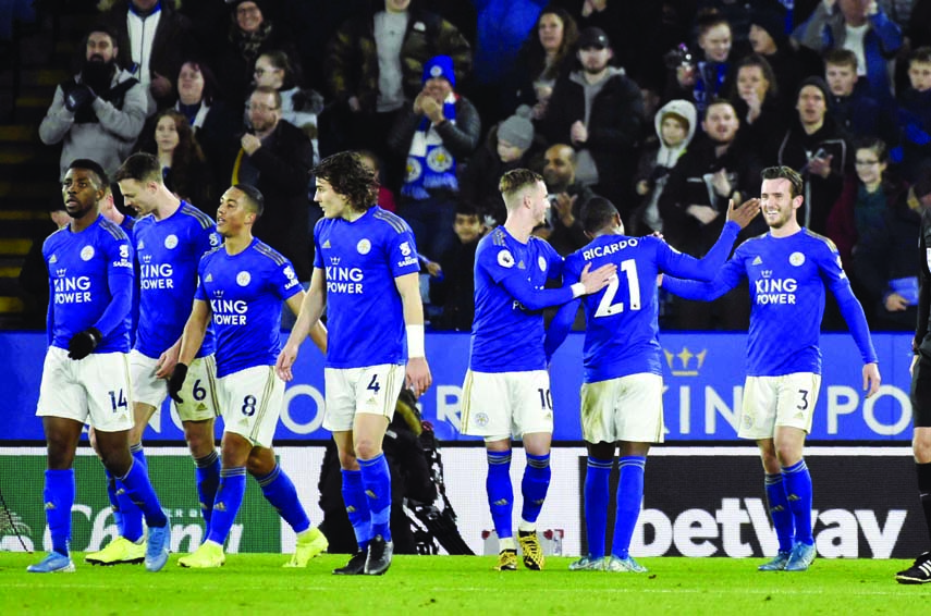 Leicester's Ricardo Pereira (second right) celebrates after scoring his side's second goal during the English Premier League soccer match between Leicester City and West Ham Utd at the King Power Stadium in Leicester of England on Wednesday.