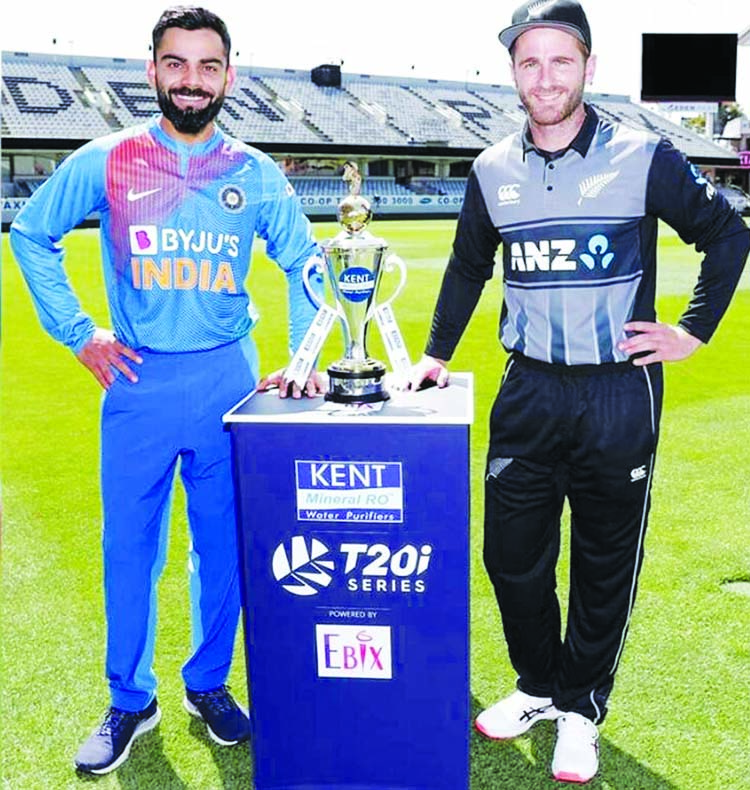 Indian captain Virat Kohli (left) and Black Caps skipper Kane Williamson pose alongside trophy ahead of the five-match T20I series on Thursday.