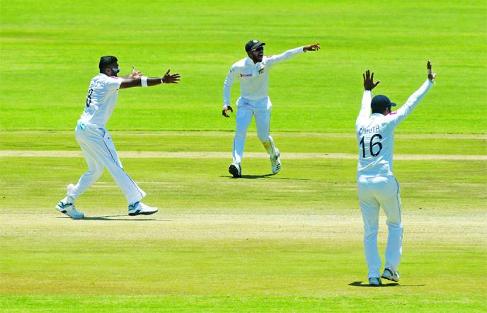 Sri Lanka players appeal for the wicket of Zimbabwean batsman Sean Williams during the Test cricket match against Zimbabwe at Harare Sports Club Ground in Zimbabwe on Thursday.