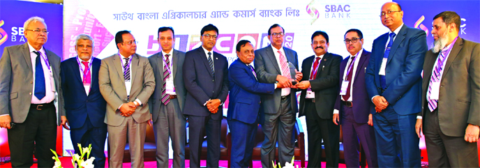 S M Amzad Hossain, Chairman of South Bangla Agriculture and Commerce (SBAC) Bank Limited, inaugurating its Annual Branch Managers' Conference-2020 at a hotel in the city on Saturday. Md. Golam Faruque, CEO, Dr. Syed Hafizur Rahman, Independent Director,