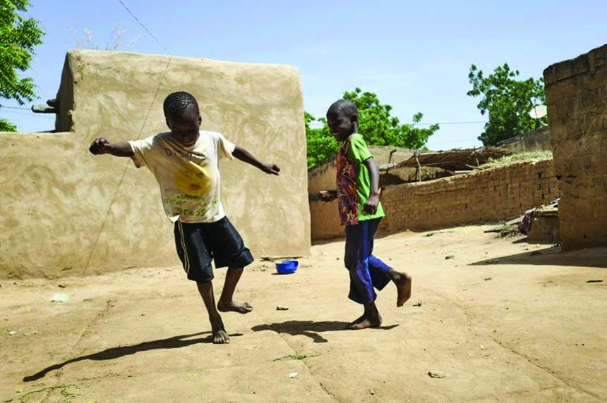Two displaced children play in Mali, which has been wracked by an Islamist insurgency that has taken a brutal toll on the youth in the Sahel AP file photo