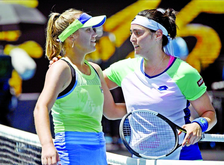 Sofia Kenin (left) of the U.S. is congratulated by Tunisia's Ons Jabeur after winning their quarterfinal match at the Australian Open tennis championship in Melbourne, Australia on Tuesday.