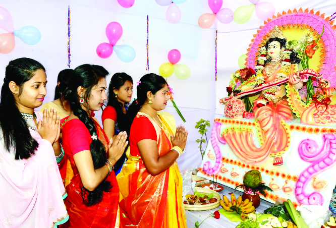 BOGURA: Students of Govt Azizul Haque College conducting puja on the occasion of the Saraswati Puja yesterday.