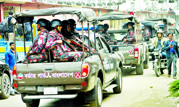 Members of Border Guard Bangladesh (BGB) patrol the streets ahead of the Dhaka north and south city corporations elections on Saturday.