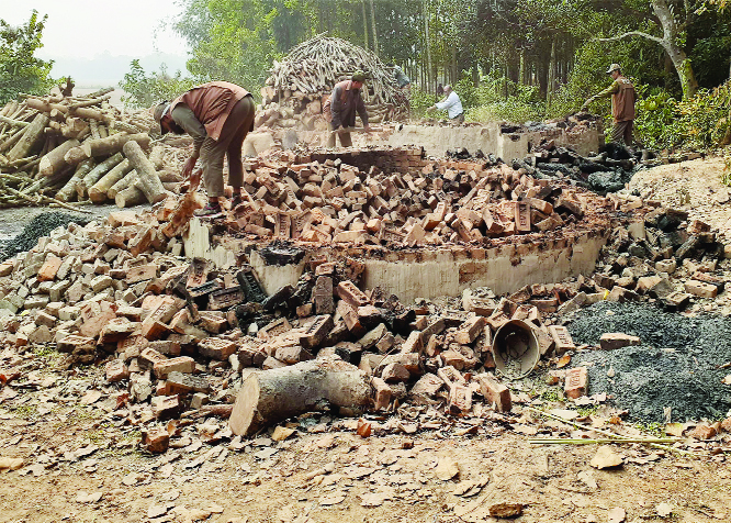 MIRZAPUR (Tangail): Forest Department demolishing illegal brickfield at Gayirabatil area on Thursday.