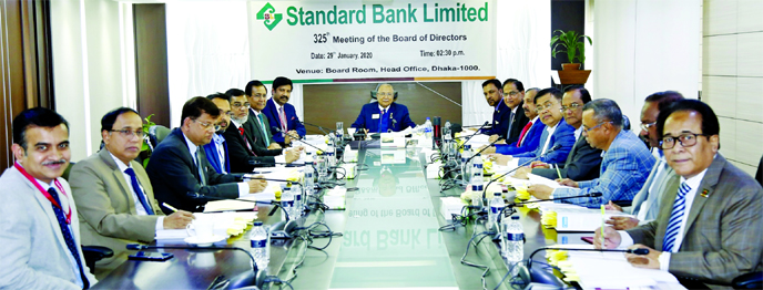 Kazi Akram Uddin Ahmed, Chairman of Standard Bank Ltd, presiding over the bank's 325th board meeting at its head office in the city on Wednesday. Vice Chairman Md Zahedul Hoque, Directors Kamal Mostafa Chowdhury, Ferozur Rahman, S A M Hossain, Mohammed A