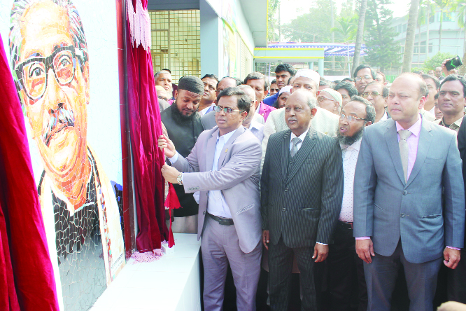 BOGURA: Chief Engineer of Public Works Department Md Ashraful Alam inaugurating the mural of Bangabandhu Sheikh Mujibur Rahman and unveiled the countdown watch of Mujib Year in PWD Office premises on Friday .