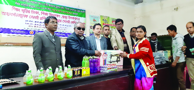 RAJSHAHI UNIVERSITY: Officials of Equal Rights Organisation (ERO) distributing scholarship ,educational materials and sewing machines on Thursday .