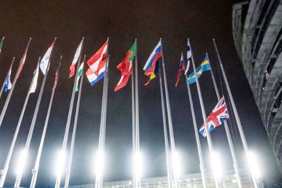 A Union flag from the United Kingdom is lowered from a flagpole at The European Parliament, in Strasbourg, on Brexit Day.