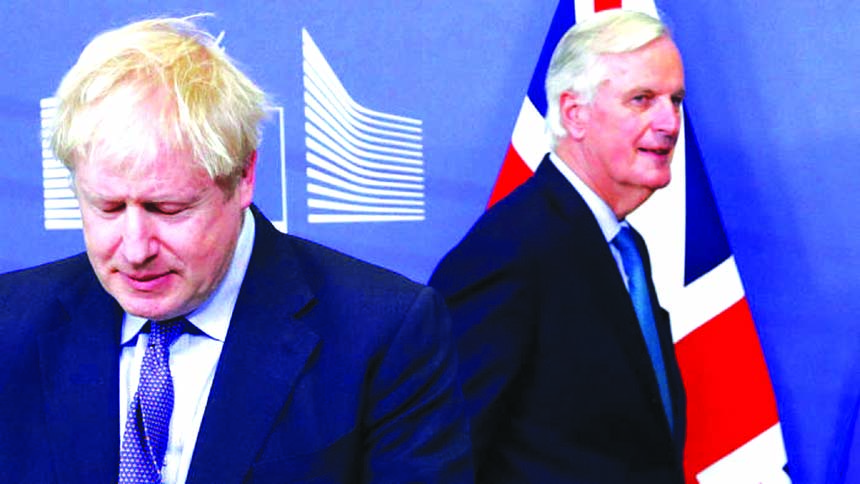 British Prime Minister Boris Johnson (L) gestures as he walks with EU chief Brexit negotiator Michel Barnier. AP file photo