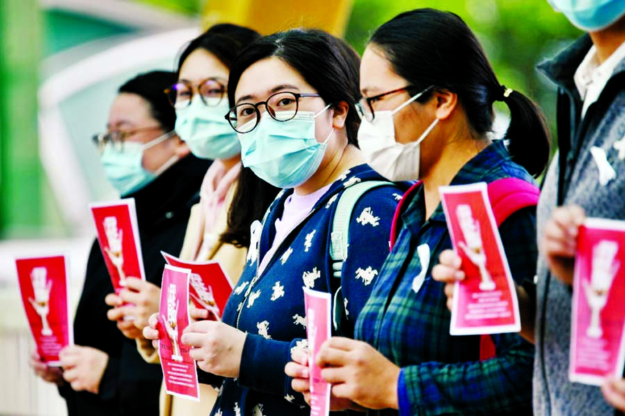 Local medical workers hold a strike near Queen Mary Hospital as they demand the city close its border with China to reduce the SARS-like virus spreading, in Hong Kong.