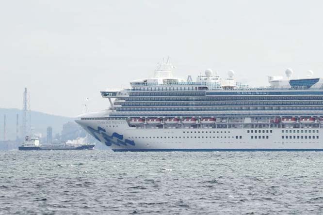 The Diamond Princess cruise ship Â® with over 3,000 people sits anchored in quarantine off the port of Yokohama.