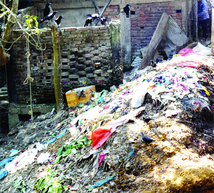 BHOLA: Garbages were shattered at different areas in Borhauddin Pourashava due to shortage of dumping station. This snap was taken from Kancha Bazar area yesterday.