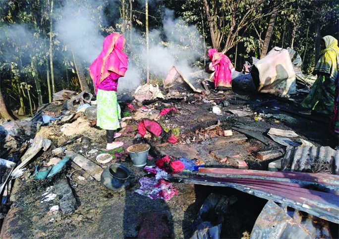 BAMNA (Barguna): A devastating fire gutted two dwelling houses at Ghudighat Village at Bamna Upazila on Monday night.