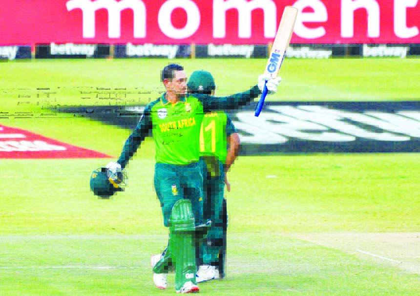 Quinton de Kock celebrates his century during South Africa's seven-wicket ODI win over England at Newlands in South Africa on Tuesday.