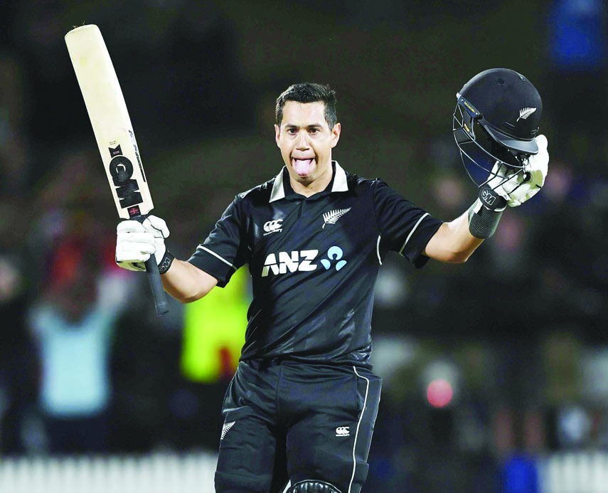 New Zealand's Ross Taylor celebrates his century during the One Day International cricket match between India and New Zealand at Seddon Oval in Hamilton of New Zealand on Wednesday.