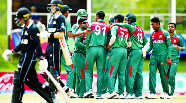 Players of Bangladesh Under-19 Cricket team celebrating after dismissal of a wicket of New Zealand Under-19 Cricket team in the second semi-final match of the ICC Under-19 World Cup at Pochefstroom in South Africa on Thursday. Bangladesh won the match by