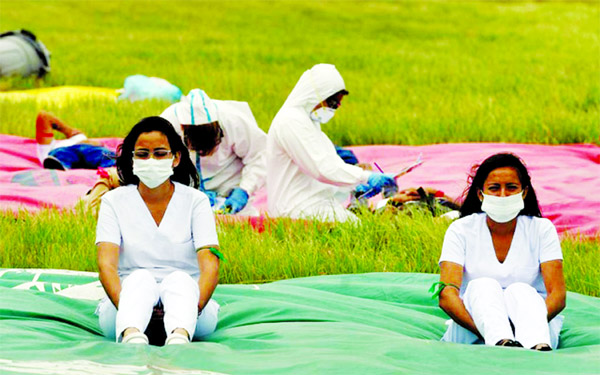 Personnel from the Health Ministry participate in a drill to prepare for the potential arrival of passengers infected with the coronavirus at the Viru Viru International Airport in Santa Cruz, Bolivia.