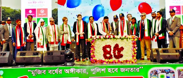 Home Minister Asaduzzaman Khan Kamal inaugurating the 45th founding anniversary of Dhaka Metropolitan Police by cutting cake at Rajarbagh Police Line in the city on Saturday.