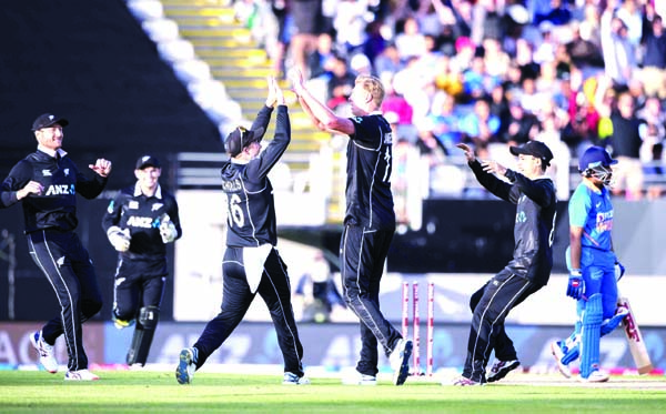 Black Caps bowler Kyle Jamieson (center right) celebrates the wicket of India's Prithvi Shaw during a One Day International cricket match between India and New Zealand at Eden Park in Auckland of New Zealand on Saturday.