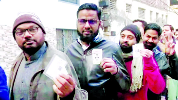 Voters queued-up at Shaheen Bagh in New Delhi to exercise their franchise on Saturday morning.