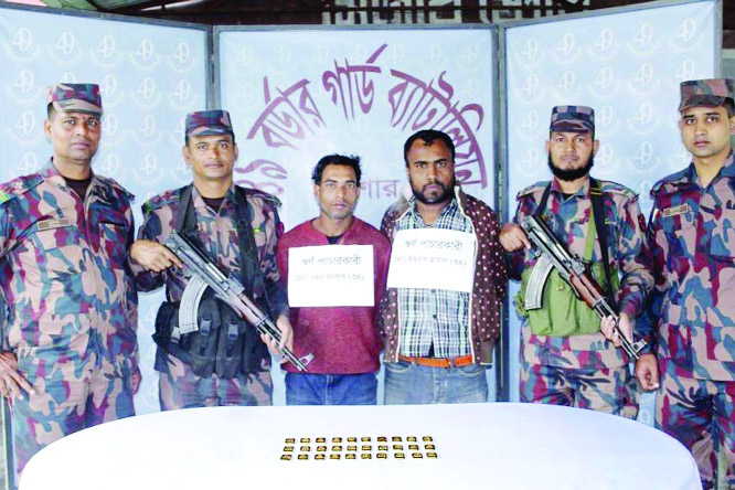 BENAPOLE: Members of Border Guard Bangladesh (BGB) arrested two alleged gold smugglers along with 30 gold bars from Boroachra Village in Benapole Port police station on Saturday .