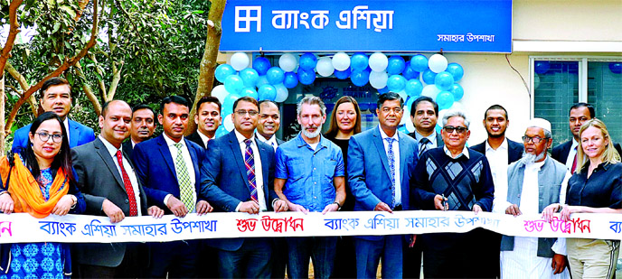 S M Iqbal Hossain, DMD of Bank Asia Ltd, inaugurating its Shomahar Sub-branch at Boktarpur of Kaliakoir in Gazipur recently. Mohammad Bin Kashem, Masum Chowdhury, Directors of Shomahar Sweaters Ltd, Kazi Arhab Ahmed and Deputy Executive Director of the Sw
