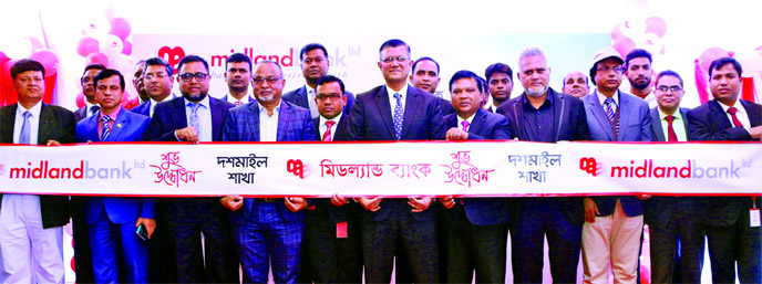 Midland Bank Limited Director Hafizur Rahman Sarker and Managing Director Md Ahsan-uz Zaman inaugurating its Doshmile Branch at East Sadipur of Kaharol Thana in Dinajpur on Sunday. Mohammad Iqbal, Head of Emerging Corporate, Md Ridwanul Hoque, Head of Ret