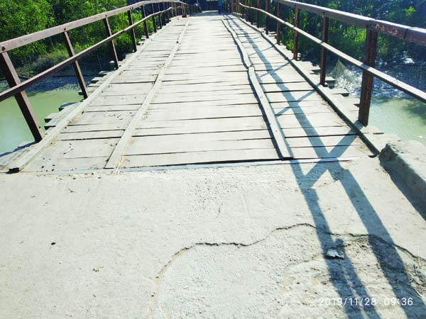 BETAGI(Barguna): The dilapidated iron bridge over Barerdhon Khal at Laxmipura Village in Betagi Upazila needs immediate repair. This snap was taken yesterday. Photo: Saidul Islam Montu