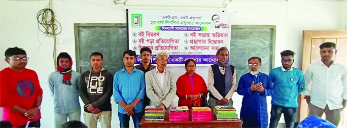 KATIADI(Kishoreganj): Books were distributed among the students of Katiadi Govt High School on the occasion of 2nd year of Deepshikha Library Andolon on Tuesday .