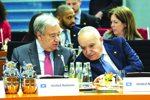 United Nations Secretary-General Antonio Guterres (L) and Special Representative and Head of the United Nations Support Mission in Libya (UNSMIL) Ghassan Salame attend an international summit on securing peace in Libya at the Chancellery in Berlin, German