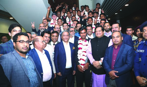 President of Bangladesh Cricket Board (BCB) Nazmul Hassan Papon receiving the members of Bangladesh Under-19 Cricket team with floral wreath at the Hazrat Shahjalal International Airport on Wednesday. State Minister for Youth and Sports Zahid Ahsan
