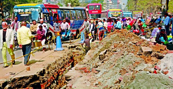 Sufferings of commuters and pedestrians becoming severe everyday as road digging work is continuing at a slow space in view of development work. This photo was taken from cityâ€™s Zero Point on Wednesday.