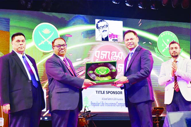 MYMENSINGH: GOC ARTDOC Lt Gen S M Shafiuddin Ahmed presenting crest to CEO of Popular Life Insurance Company Ltd BM Yousuf Ali at the Basanter Ullas' , a special cultural programme at Mymensingh Cantonment recently.
