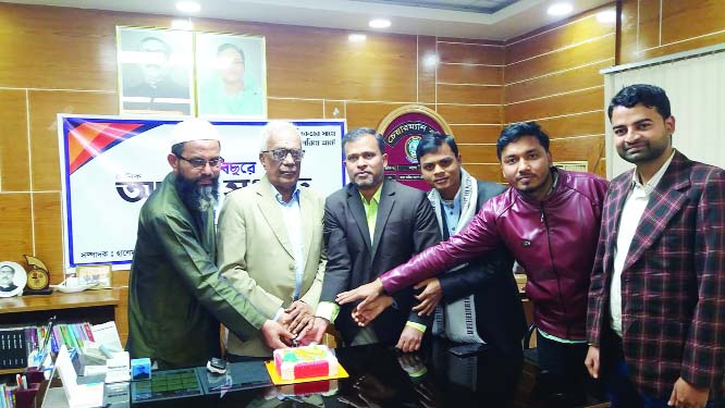 FENI: Aziz Ahmed Chowdhury, Chairman, Zila Parishad cutting cake on the occasion of the 7th founding anniversary of The Daily Amar Sangbad in Feni on Wednesday.