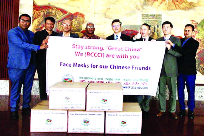 Md. Shahjahan Mridha Benu, Secretary General of Bangladesh China Chamber of Commerce & Industry (BCCCI), face masks to the Li Jiming, Ambassador of China to Bangladesh fight against Coronavirus recently.