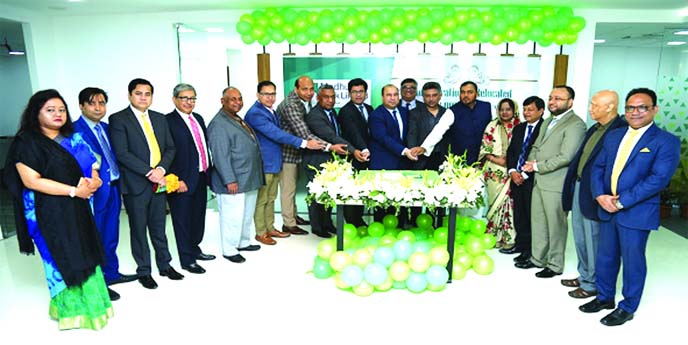 Humayun Kabir, Chairman of the Board of Directors of Modhumoti Bank Limited, inaugurating the bank's new head office at Gulshan in the capital by cutting a cake recently. Noor-E-Alam Chowdhury, MP, Sponsor of the bank and Barrister Sheikh Fazle Noor Tapo