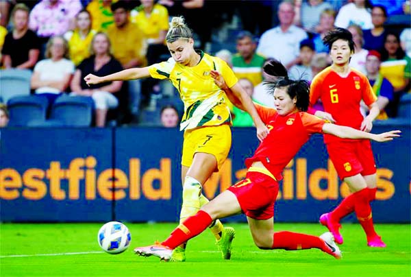 Luo Guiping (centre) of China vies with Stephanie Catley (left) of Australia during the Women's Olympic Football Tournament 2020 Qualifiers match between Australia and China, at Sydney in Australia on Thursday.