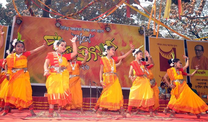 Children ware performing dance at a function in observance of the Basanto Utsab at Railway Museum premises on Friday.